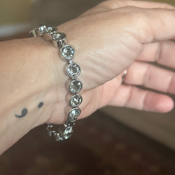 Touchstone Crystal Silver Tennis Bracelet - Picture 4 of 7